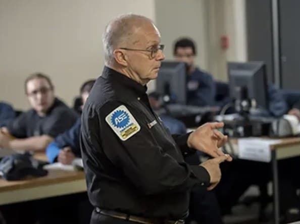 Instructor leading a technician training class